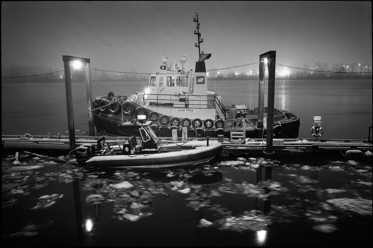 Boats moored on the Fraser River on a blustery winter evening