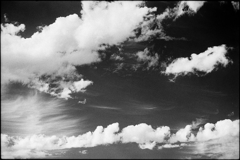 Clouds form in wispy long formations.